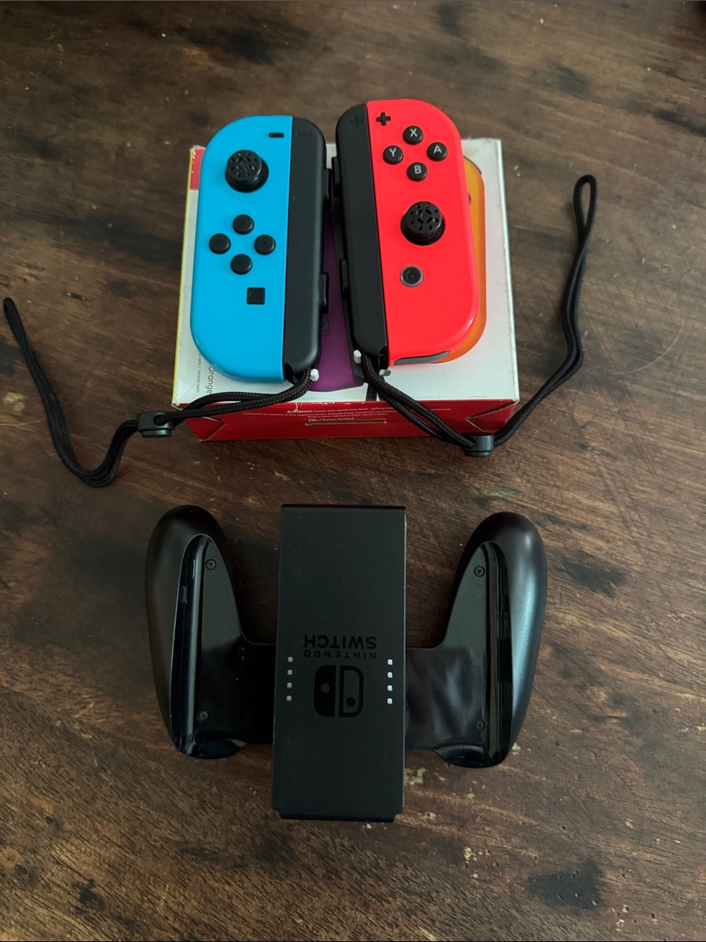 EUC Nintendo Neon Blue & Neon Red Joy-Con Pair with Black Grip